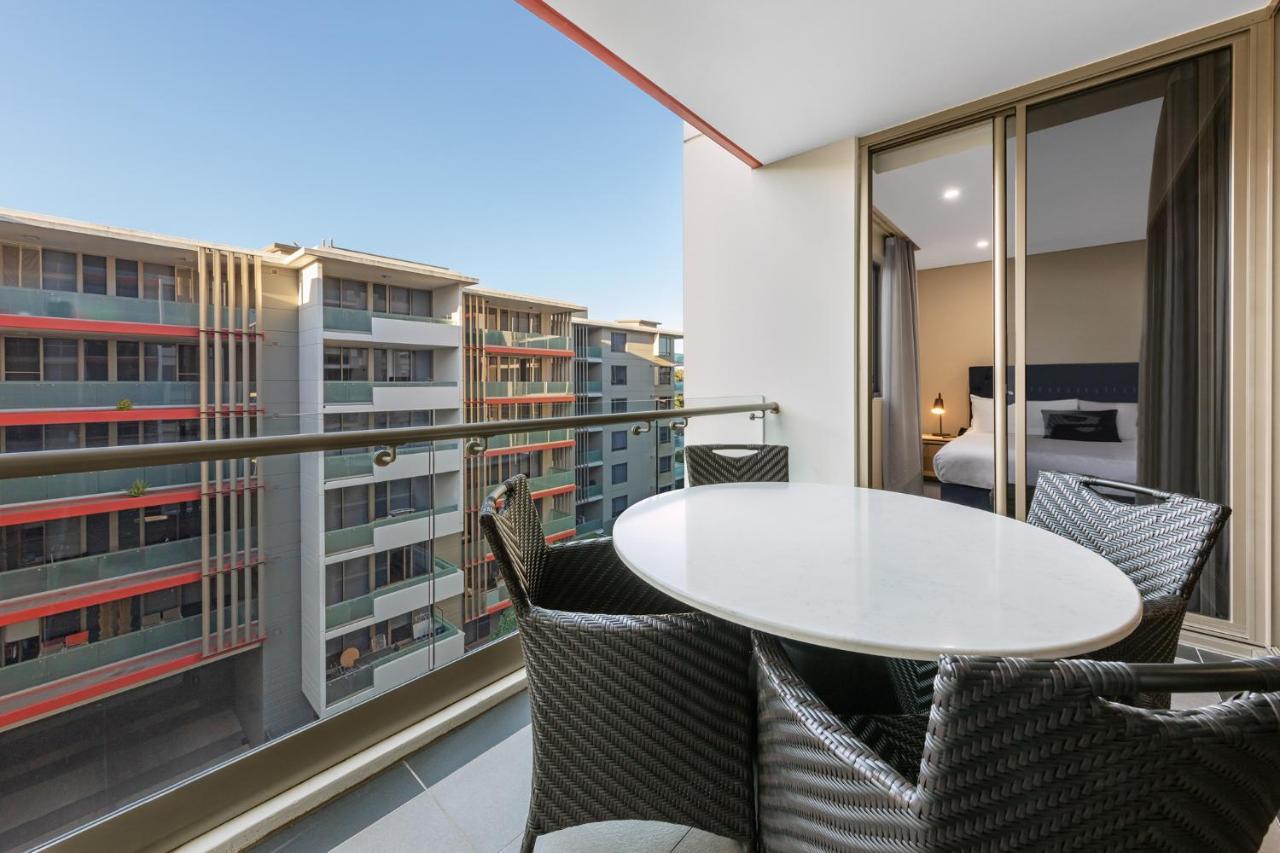 Meriton Suites North Ryde Sydney Exterior photo Balcony of a two-bedroom apartment